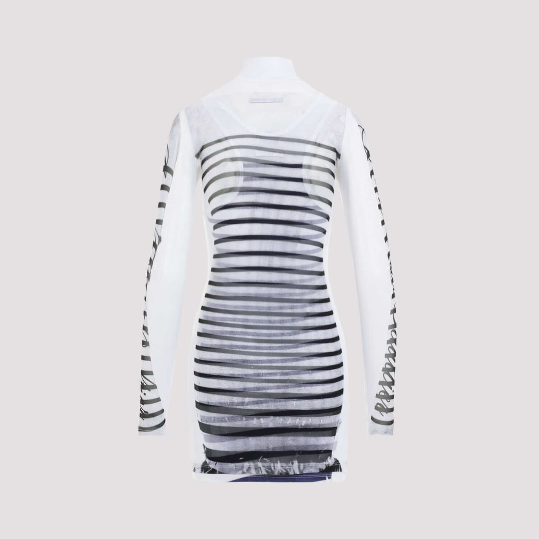 White dress with black and gray striped pattern on a light gray background
