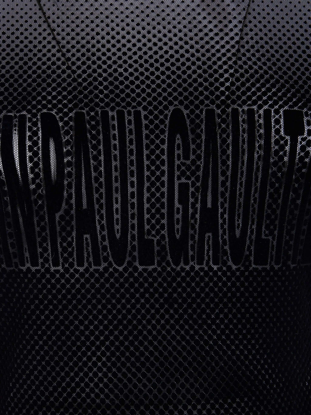 Black text on a textured black background