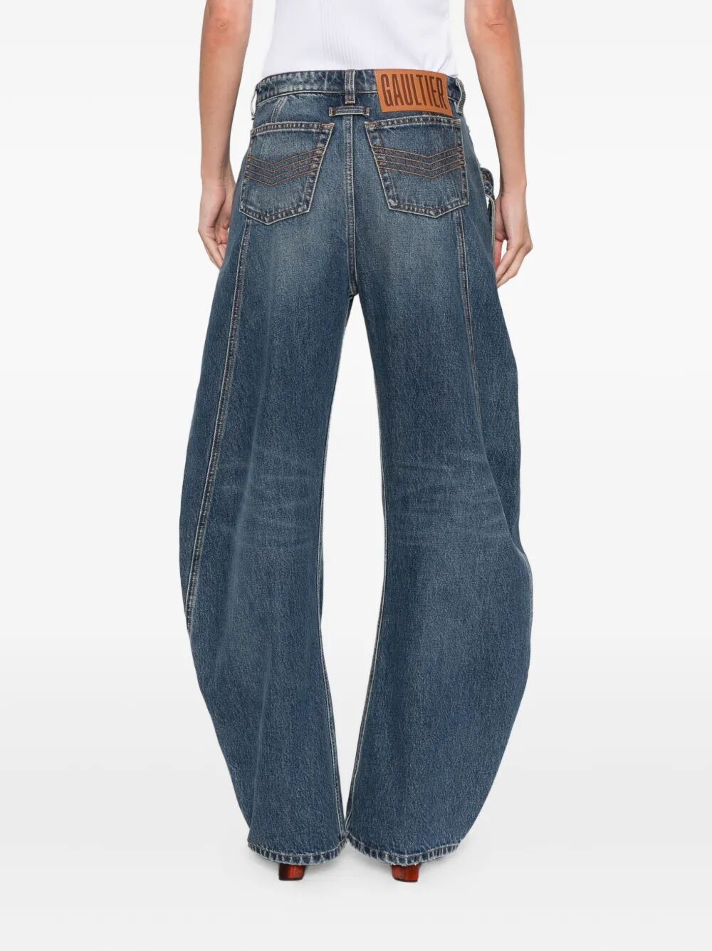 Wide-leg jeans with brand logo on a white background