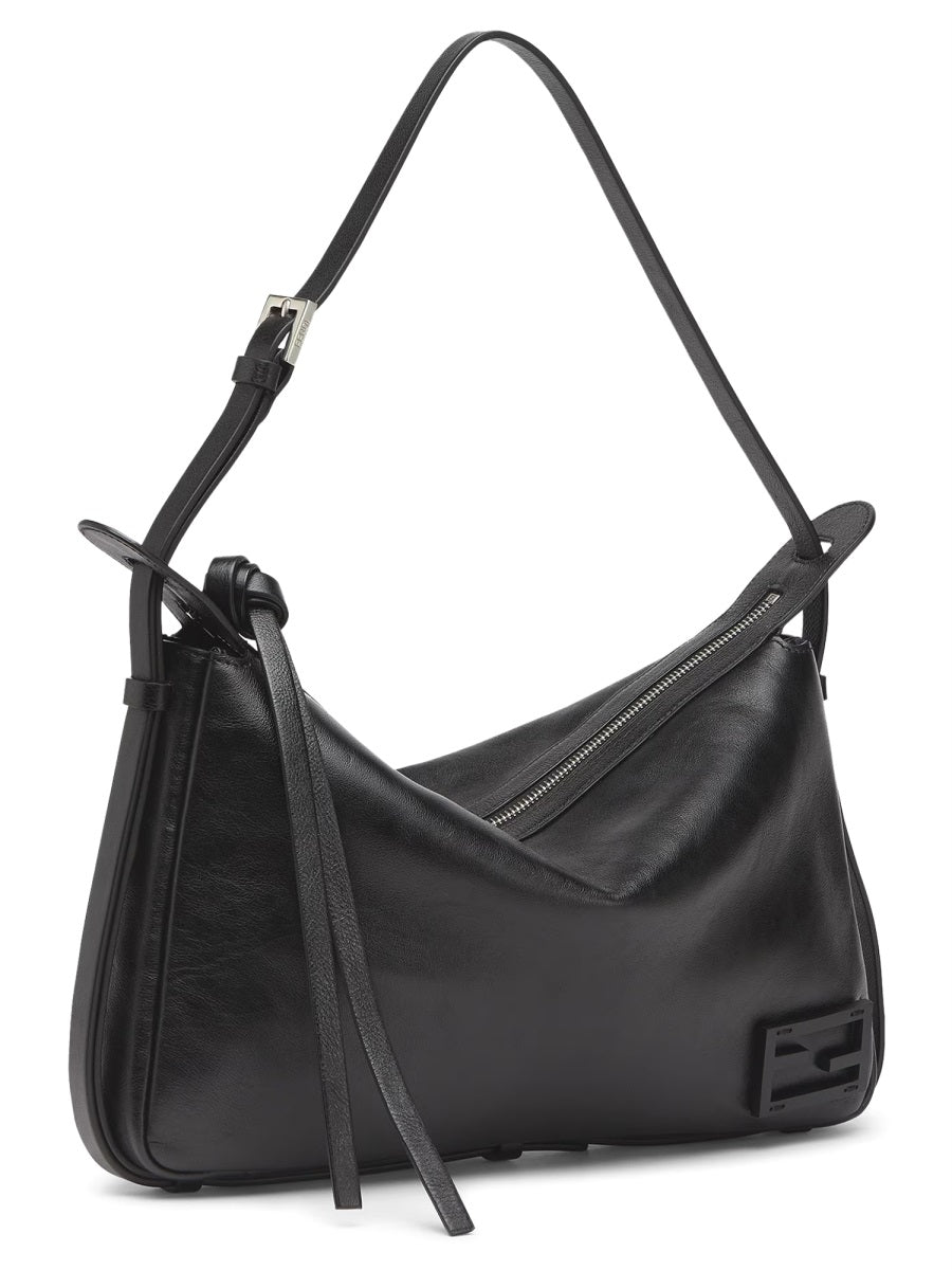 Black handbag with a visible brand logo on a white background
