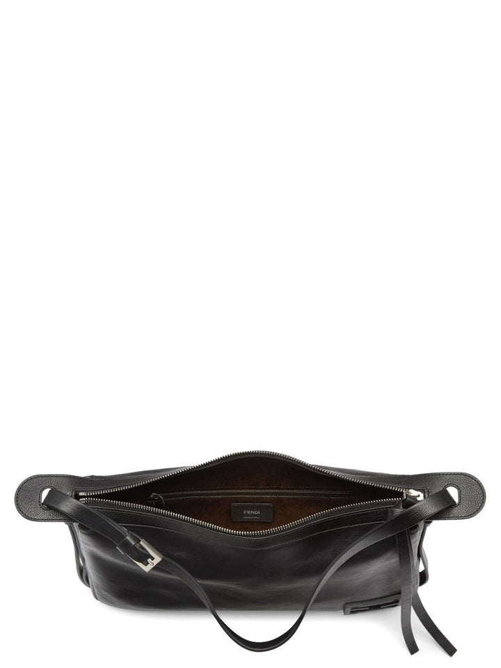 Black leather handbag with a visible brand logo on a white background