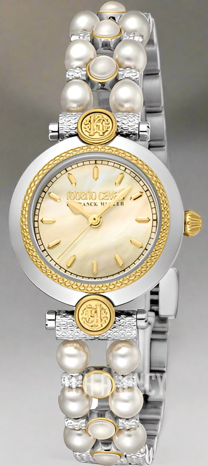 Watch with pearl-like band and gold accents on a white background