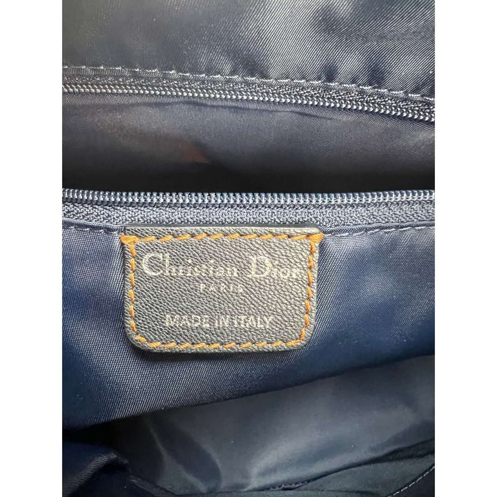 Interior view of CHRISTIAN DIOR Monogram Trotter CD Blue Canvas Hand Bag showing tag, made in Italy, luxury bags.