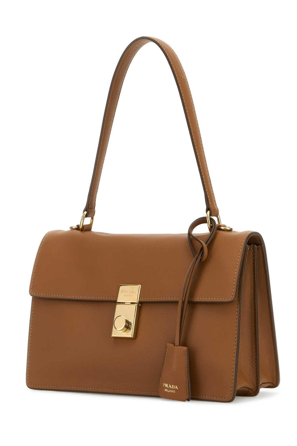 Brown leather handbag with gold clasp on a white background