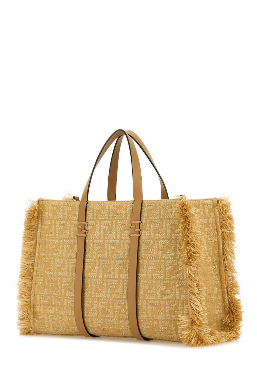 Yellow woven tote bag with brown leather handles and fringes on a white background