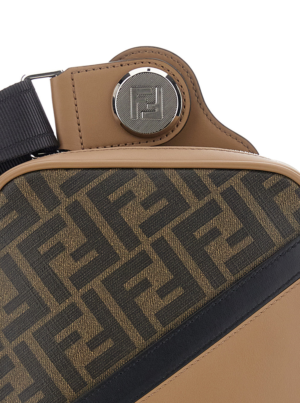Close-up of a brown and black patterned bag with a brand logo on a white background