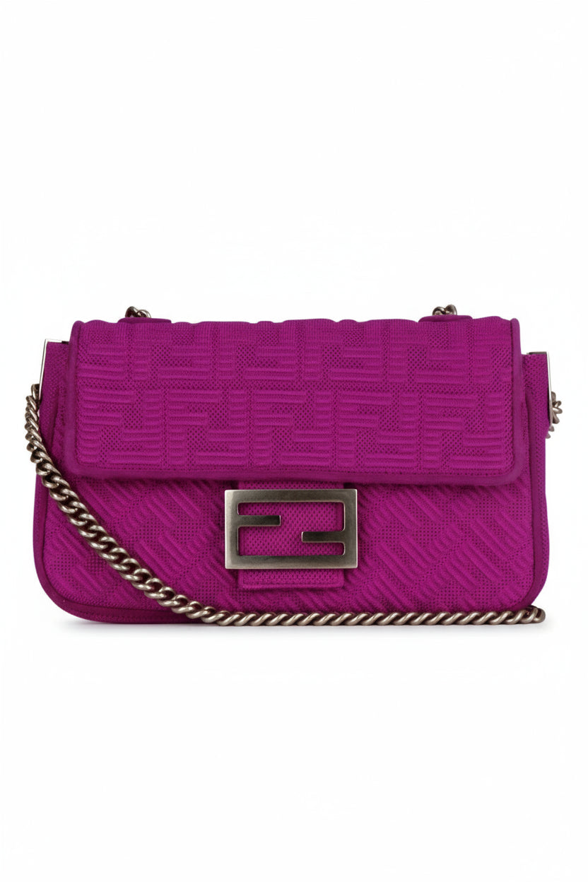 Purple handbag with a chain detail on a white background