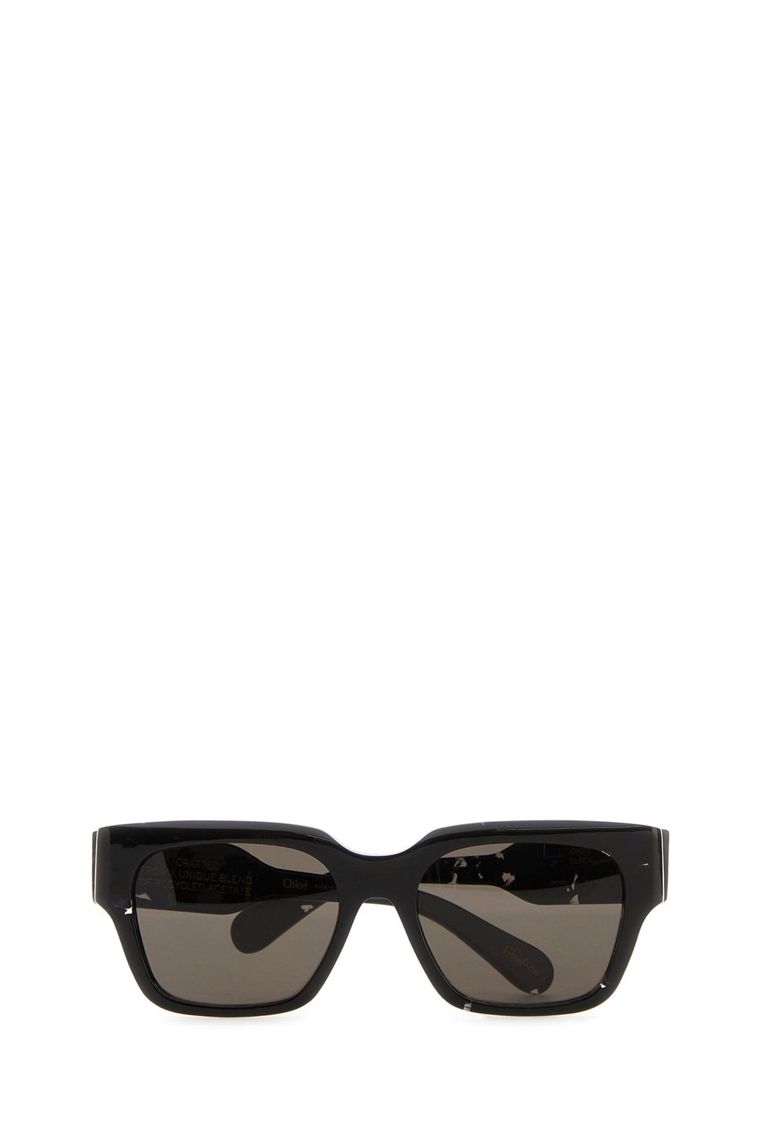 Black sunglasses with dark lenses on a white background