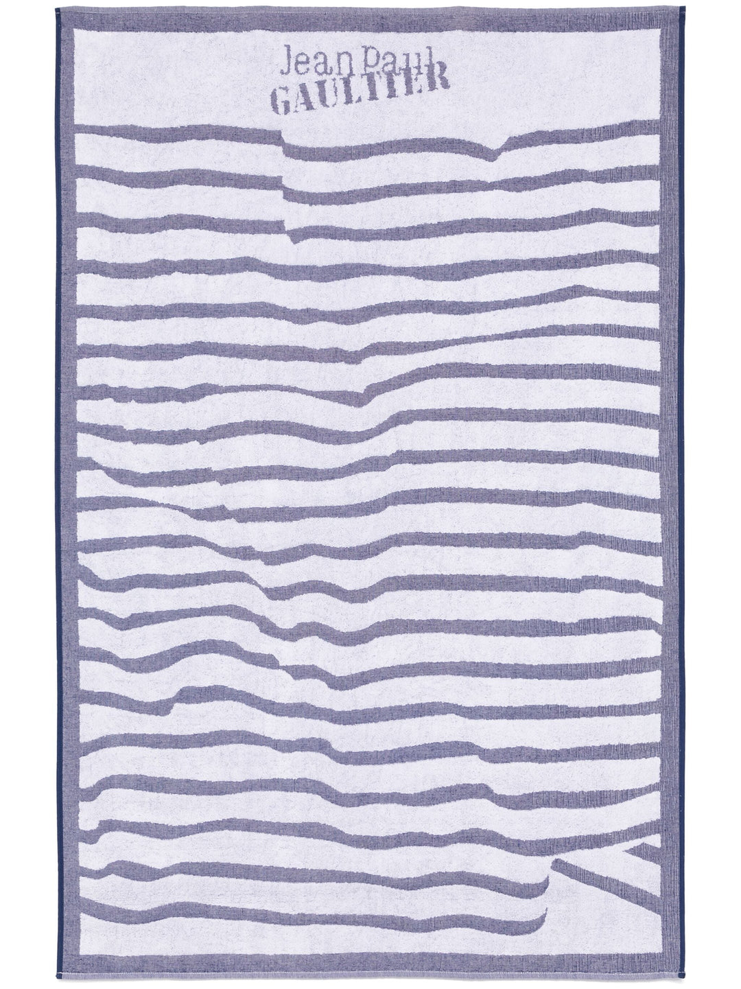 Striped towel with 'Jean Paul Gaultier' branding on a white background