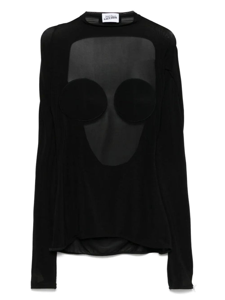 Black long-sleeve top with sheer circular panels on a white background