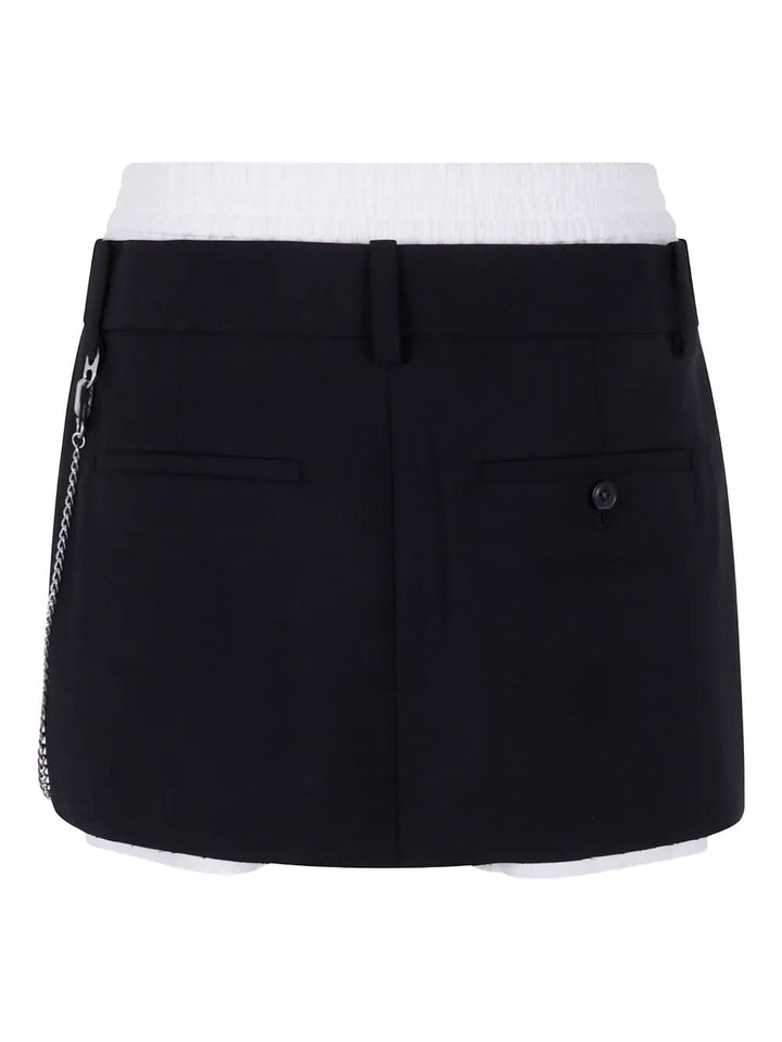 Black skirt with white waistband on a white background