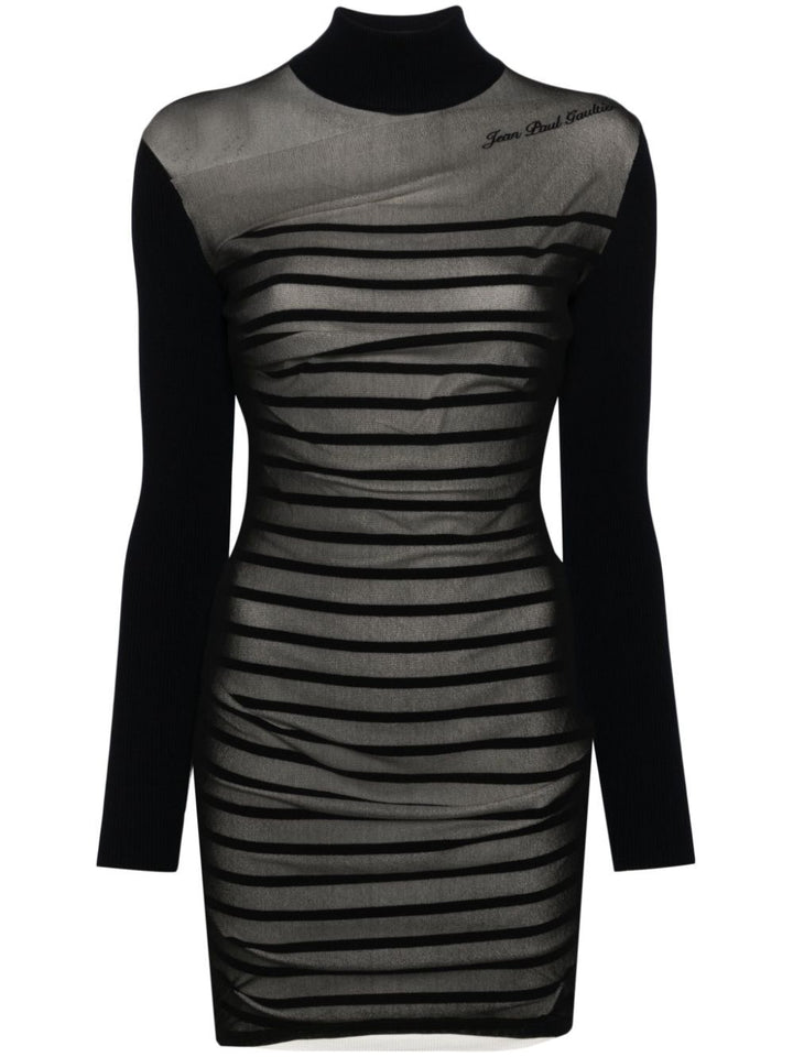 Black and gray striped dress with long sleeves on a white background