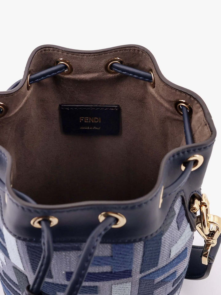 Fendi bucket bag with blue patterned exterior and brown interior on a white background