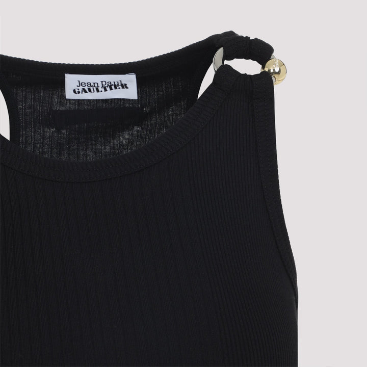 Black ribbed sweater with a brand label on a light gray background