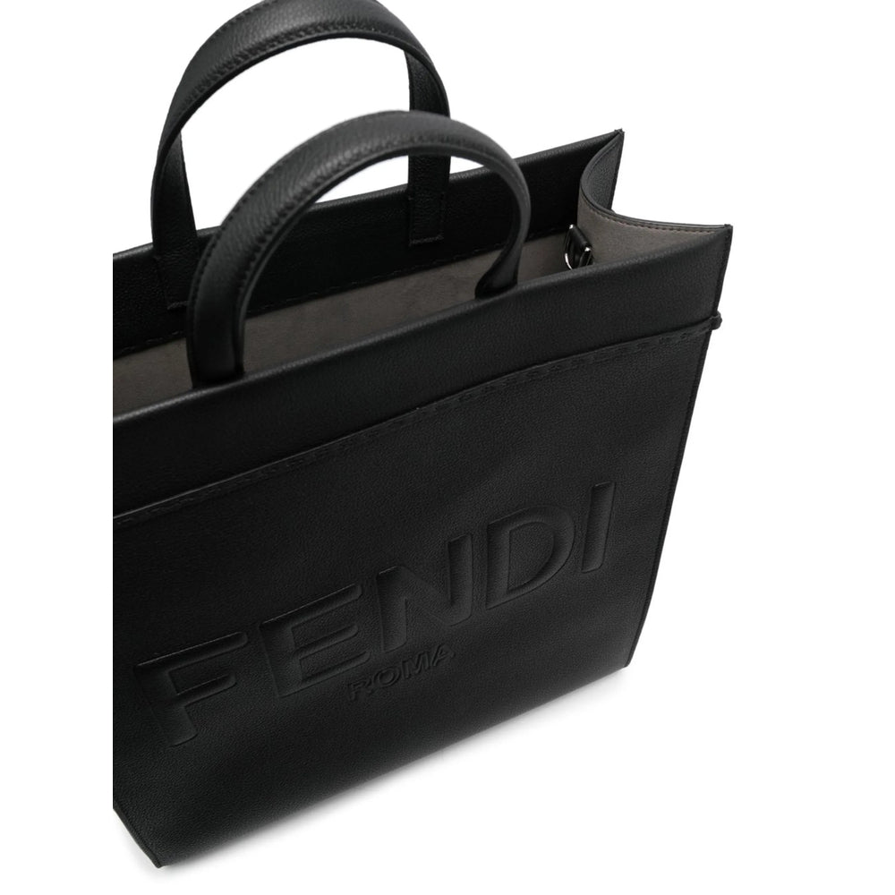 Black Fendi handbag on a white background