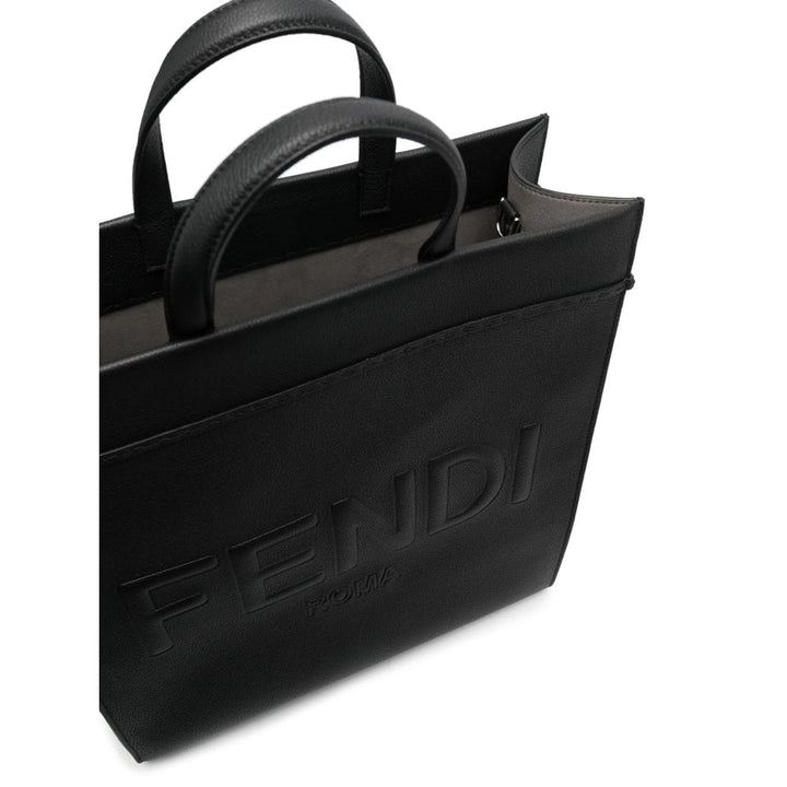 Black Fendi handbag on a white background