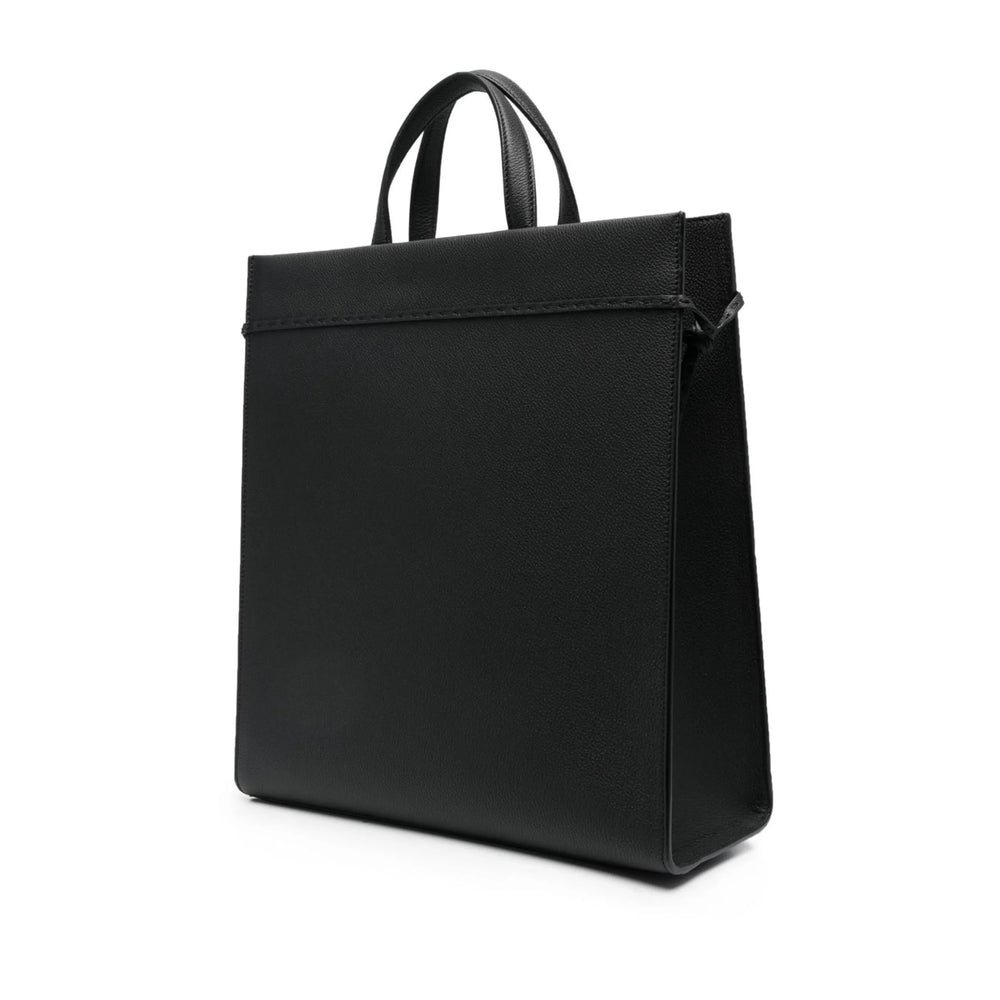 Black leather handbag on a white background