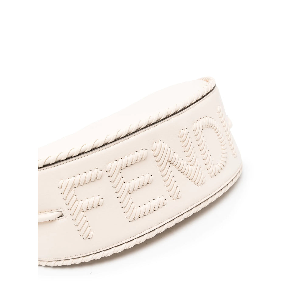 Close-up of a white shoe with brand logo on a white background