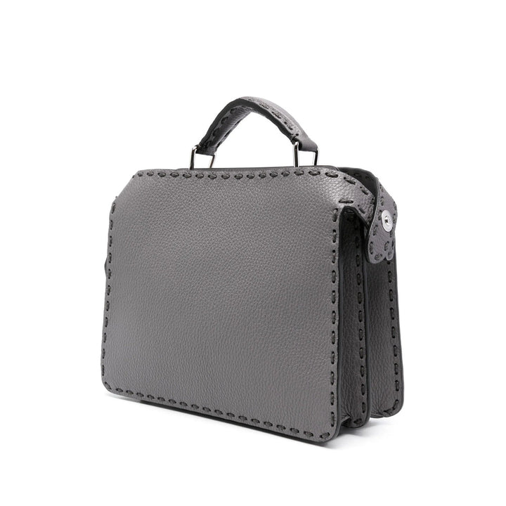 Gray leather wallet with handle on a white background