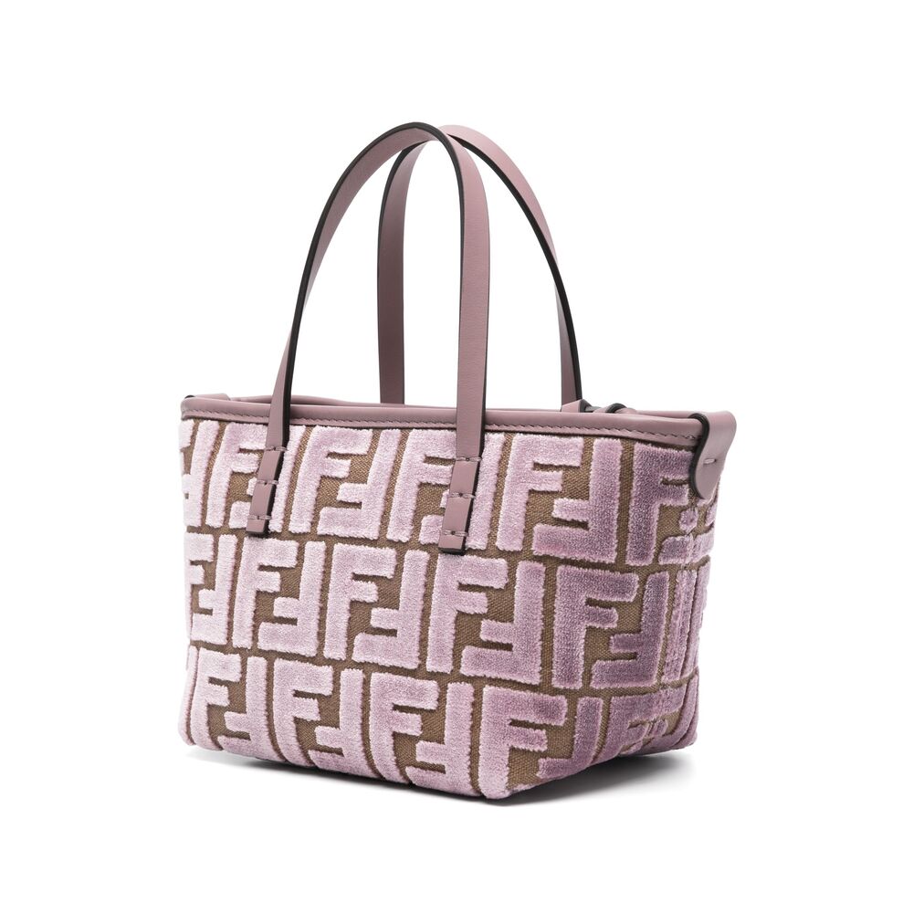 Handbag with a patterned design on a white background