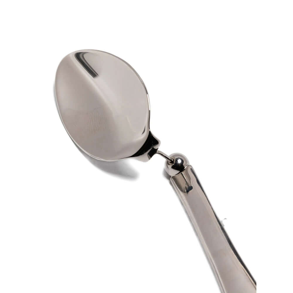 Silver spoon on a white background