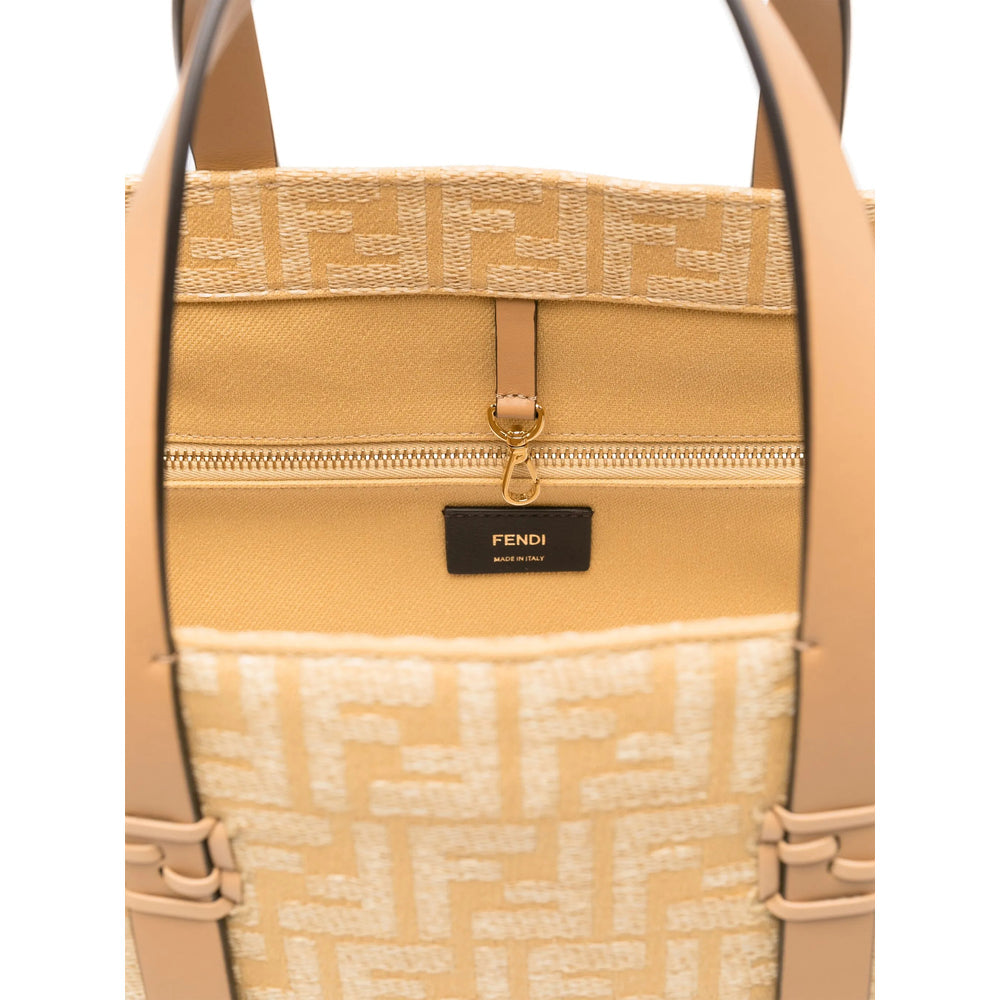Beige handbag with Fendi logo and tag on a white background