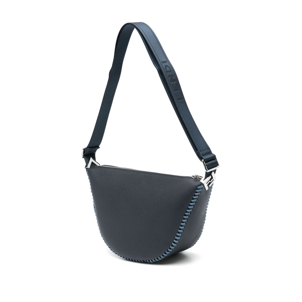 Navy blue shoulder bag with a strap on a white background