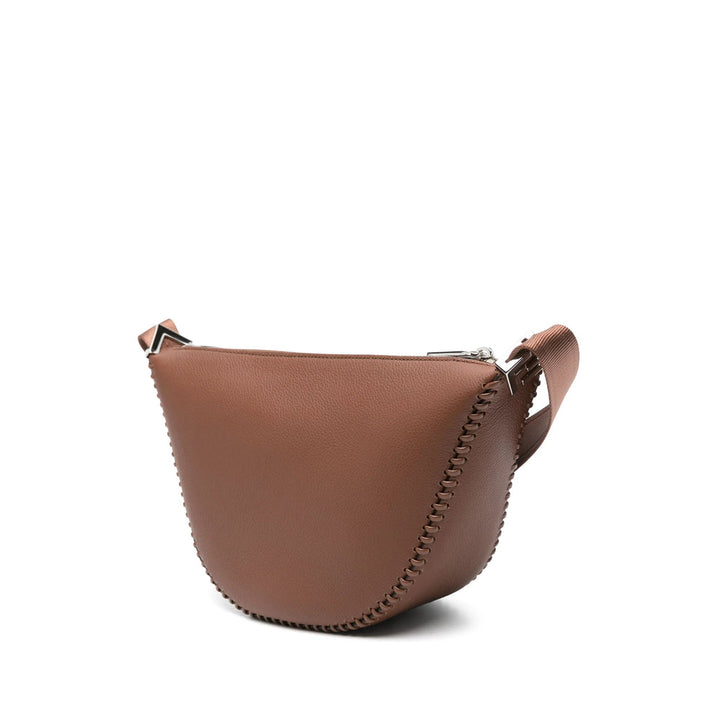 Brown leather bag with a strap on a white background