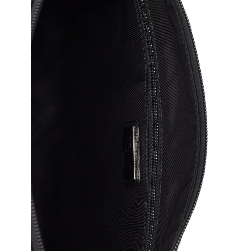 Close-up of a black guitar case with a brand logo on a white background