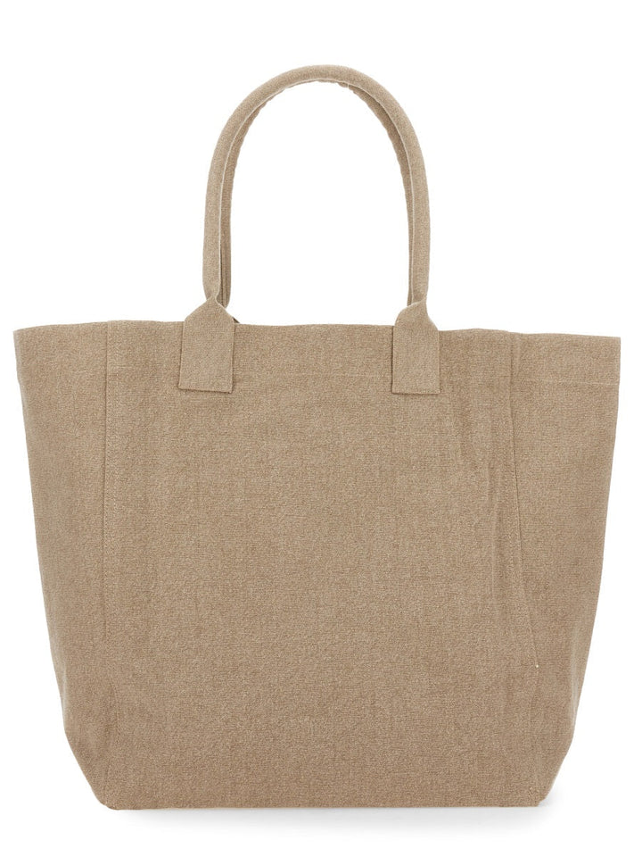 Beige tote bag on a white background