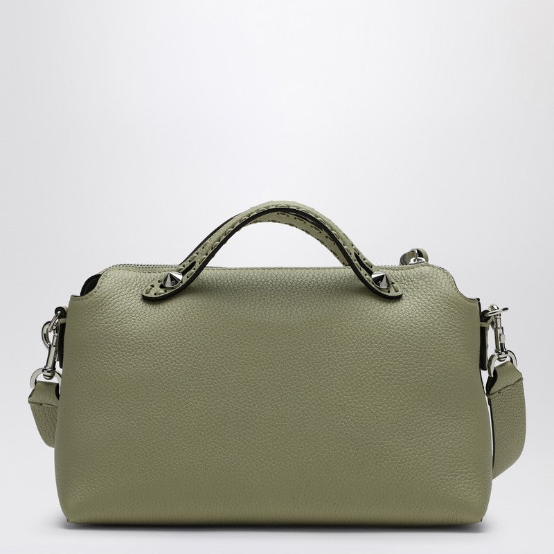 Green handbag on a white background