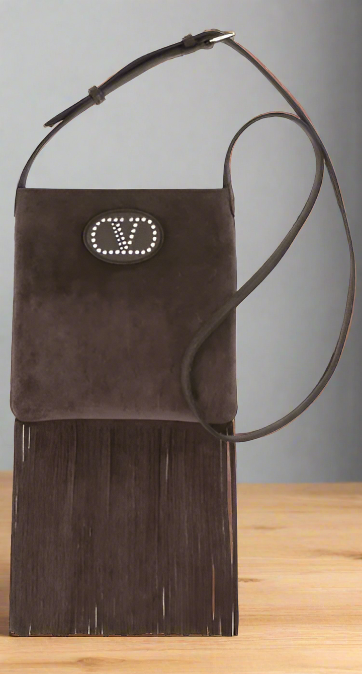 Valentino Garavani women's designer handbag in leather Luxury Valentino Garavani shoulder bag with iconic studs Valentino Garavani crossbody bag in black with gold accents