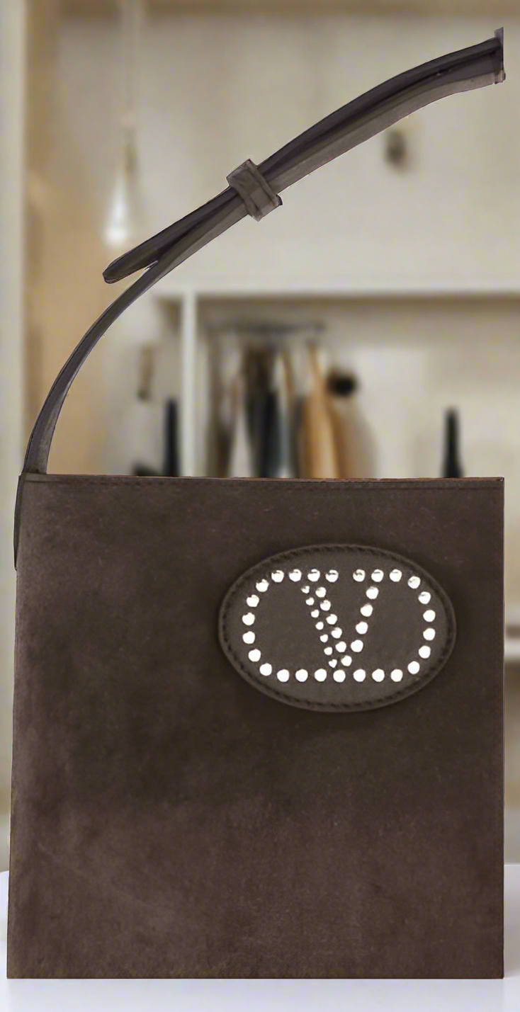 Valentino Garavani women's designer handbag in leather Luxury Valentino Garavani shoulder bag with iconic studs Valentino Garavani crossbody bag in black with gold accents