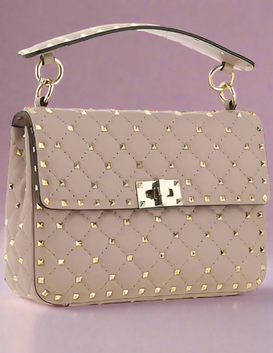 Valentino Garavani women's designer handbag in leather Luxury Valentino Garavani shoulder bag with iconic studs Valentino Garavani crossbody bag in black with gold accents