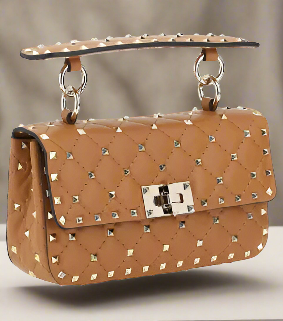 Valentino Garavani women's designer handbag in leather Luxury Valentino Garavani shoulder bag with iconic studs Valentino Garavani crossbody bag in black with gold accents