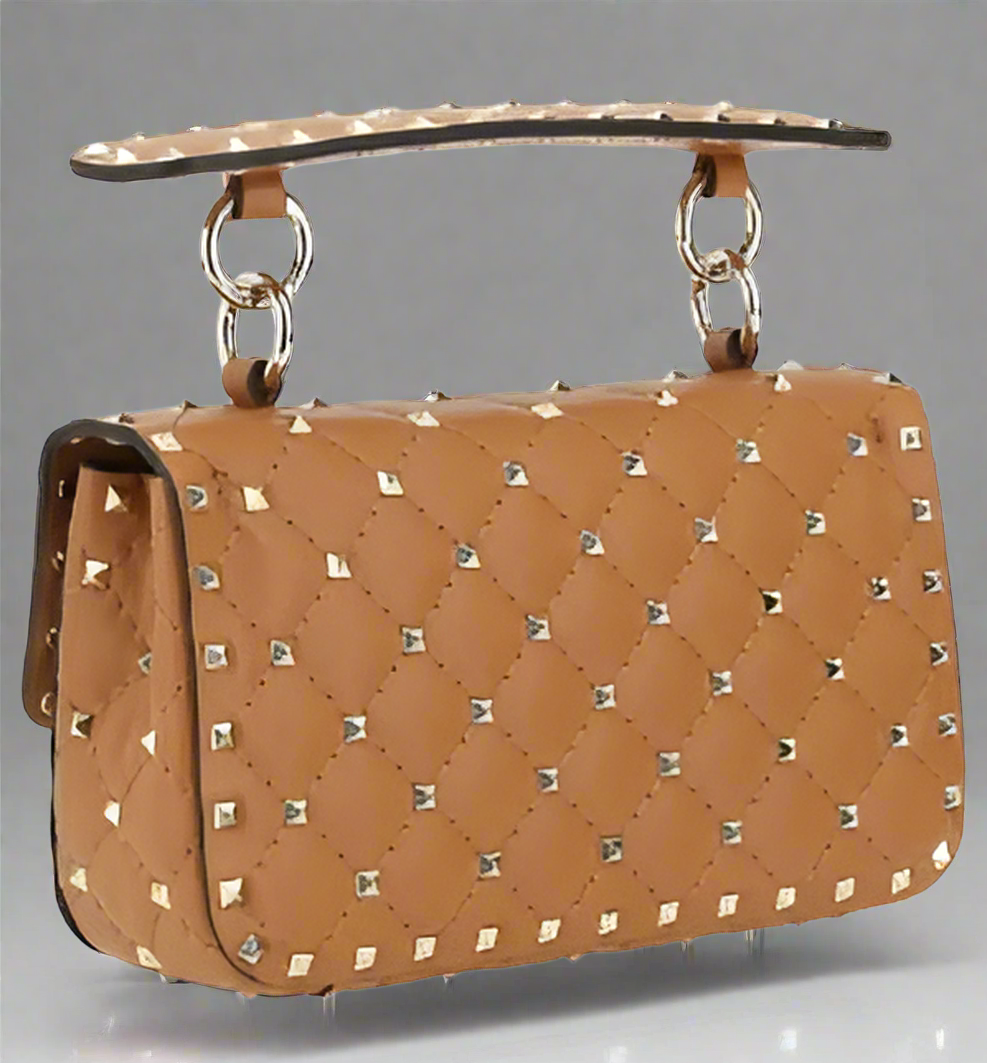 Valentino Garavani women's designer handbag in leather Luxury Valentino Garavani shoulder bag with iconic studs Valentino Garavani crossbody bag in black with gold accents