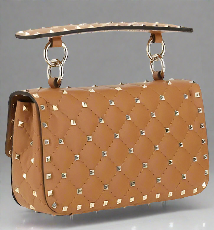 Valentino Garavani women's designer handbag in leather Luxury Valentino Garavani shoulder bag with iconic studs Valentino Garavani crossbody bag in black with gold accents