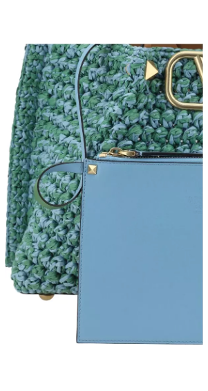 Valentino Garavani women's designer handbag in leather Luxury Valentino Garavani shoulder bag with iconic studs Valentino Garavani crossbody bag in black with gold accents