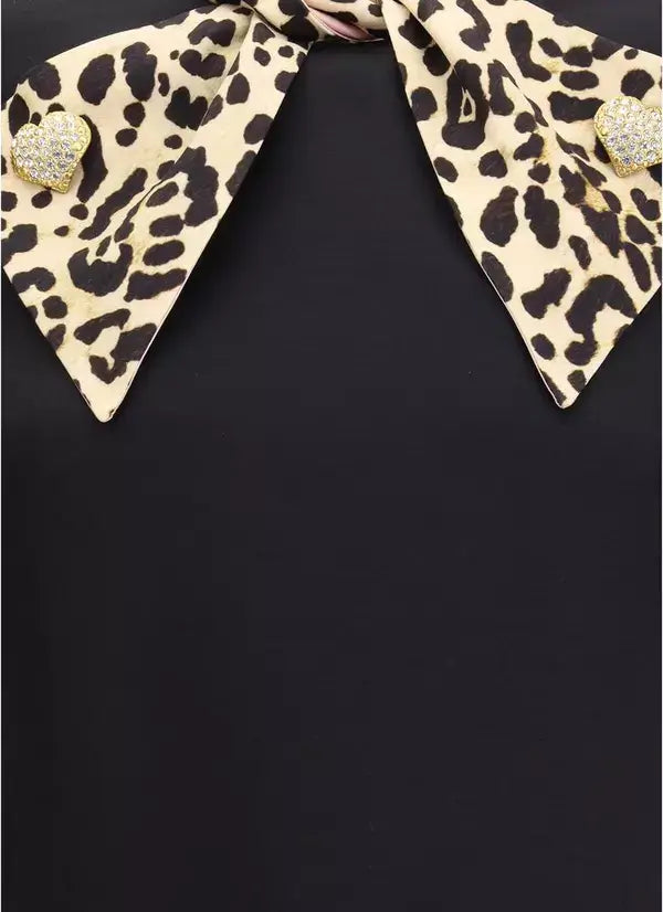 Leopard print bow tie with decorative elements on a black background