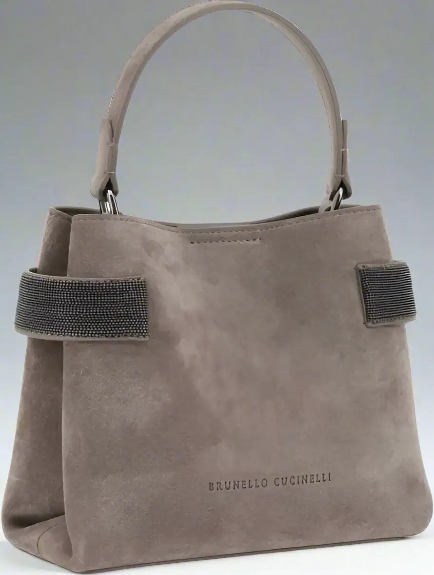 Gray handbag with straps on a white background