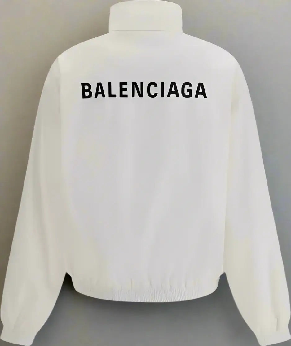 White jacket with 'BALENCIAGA' branding on the back against a white background