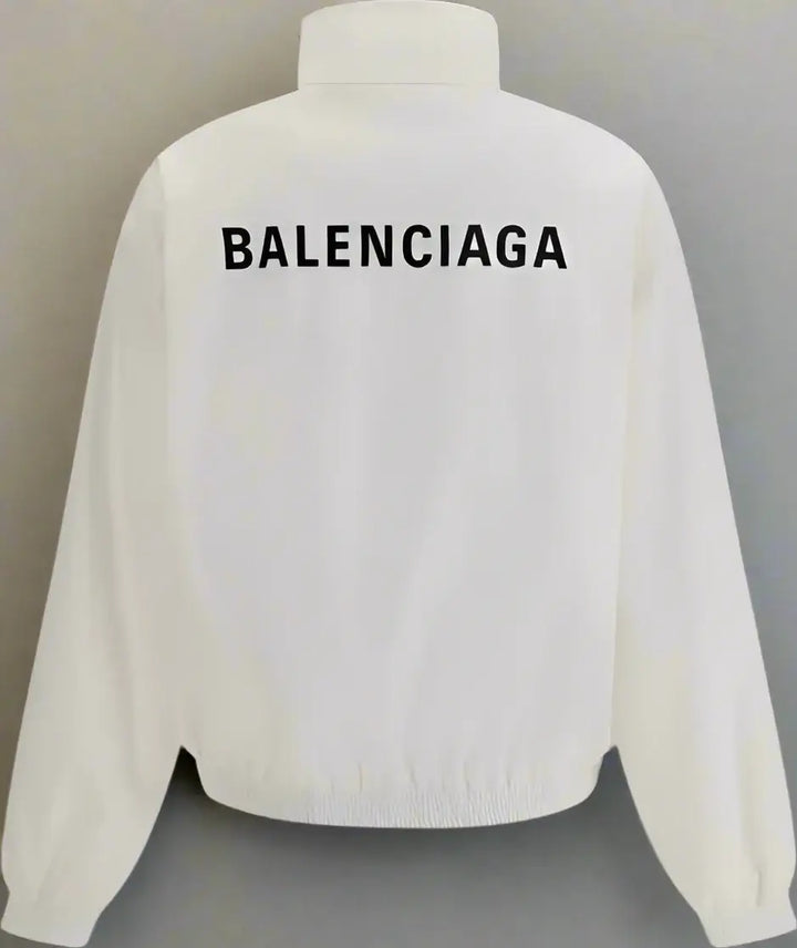 White jacket with 'BALENCIAGA' branding on the back against a white background