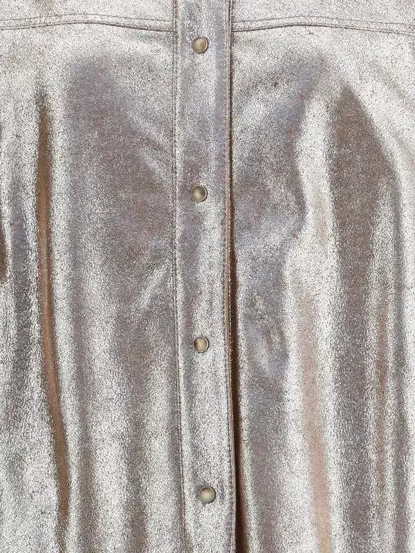 Close-up of a textured fabric with button details