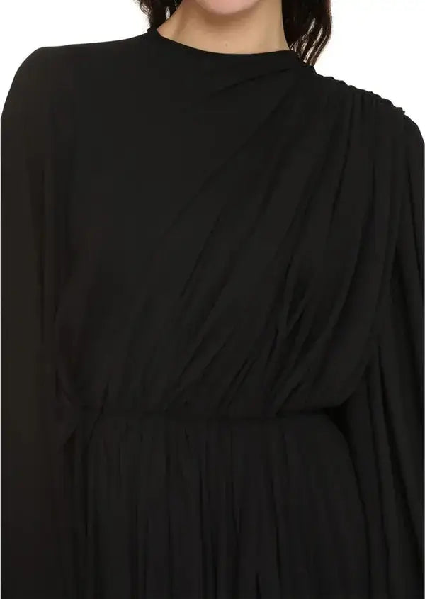 Black draped dress on a white background