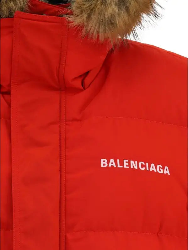 Red jacket with fur hood and Balenciaga logo on a white background