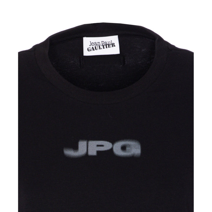 Black t-shirt with 'JPG' logo and 'Jean Paul Gaultier' label on a white background