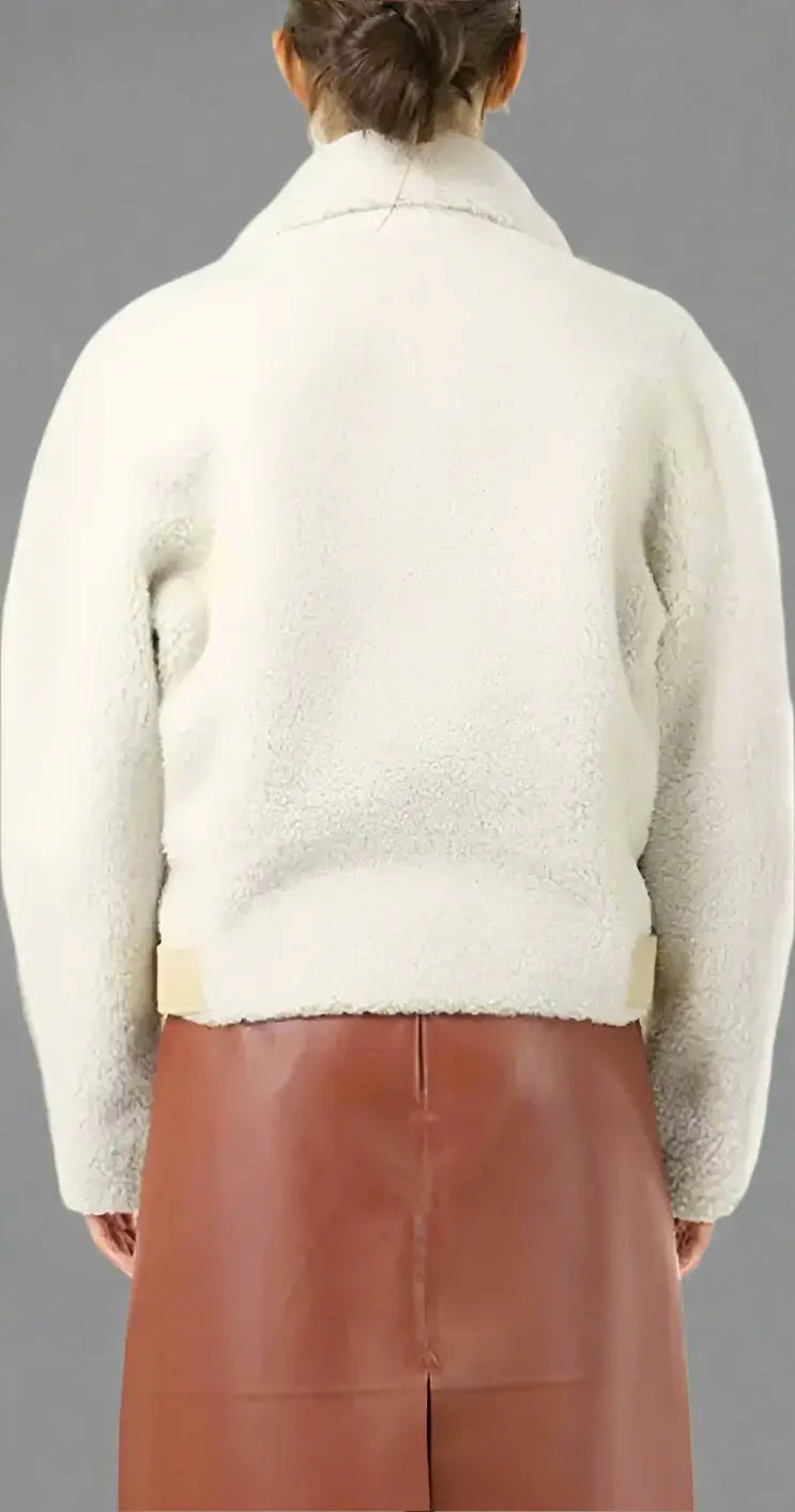 Woman in white jacket