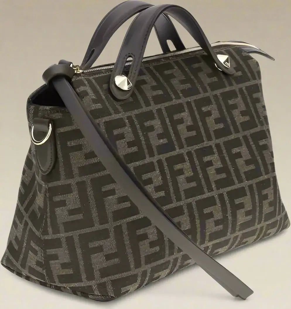 Designer handbag with a distinctive pattern on a white background