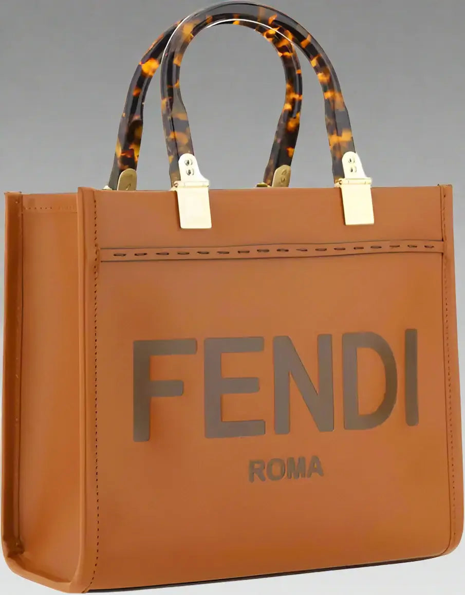Brown Fendi handbag with tortoiseshell handles on a white background