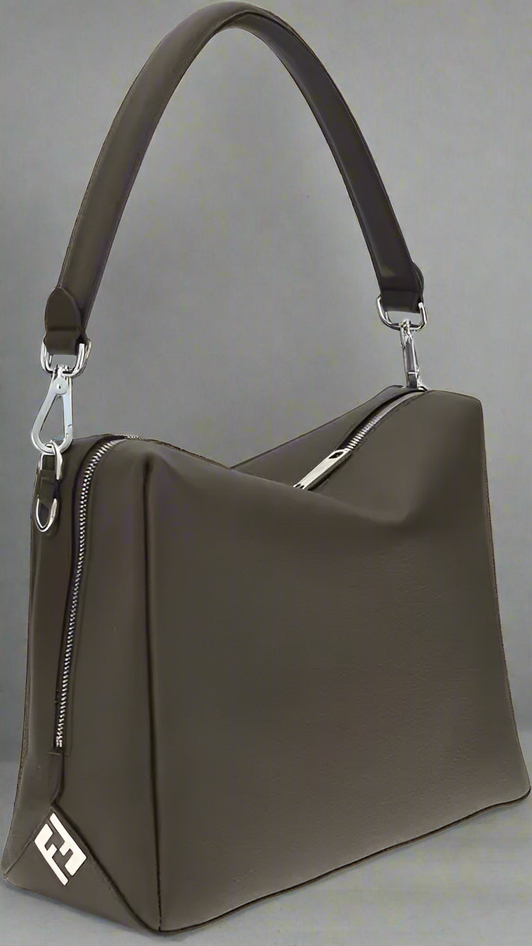 Dark brown handbag with a visible brand logo on a white background